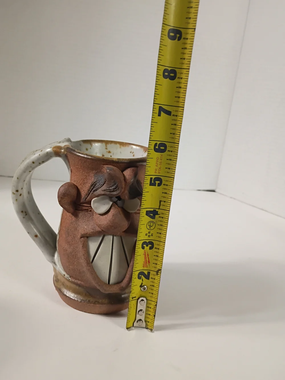 Hand Made pottery-crazy face mug-drunk confused or stoned dude